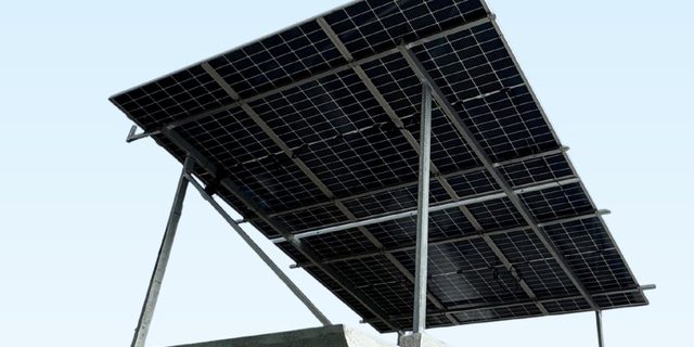A tilted rooftop solar array on its mounting structure