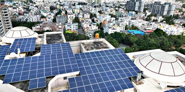 Rooftop array on a housing society terrace